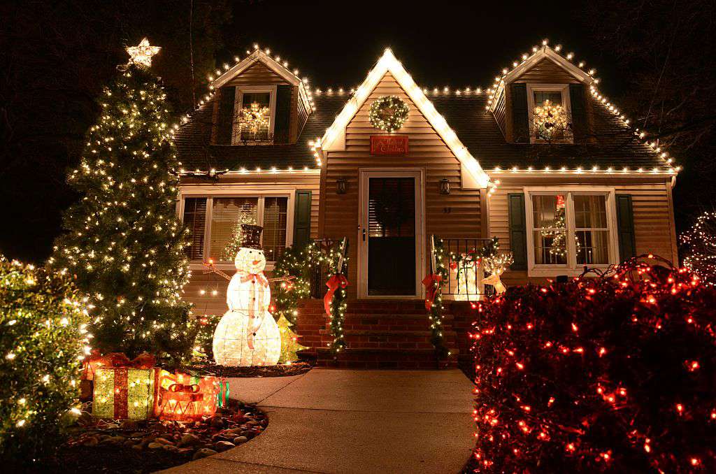 Classic Christmas lights on a family home and front yard